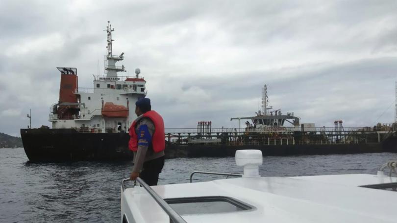 The tanker Elisabeth had 21 crew on board when it caught fire in Bali's Karangasem district. (AP PHOTO)