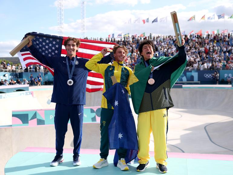 Keegan Palmer celebrates his gold medal. 