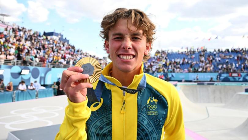 Australian skateboarder Keegan Palmer poses with his gold medal after winning in Paris.