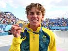 Australian skateboarder Keegan Palmer poses with his gold medal after winning in Paris.