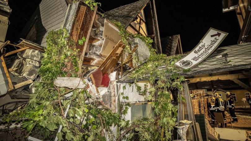 Part of a hotel in Kroev, Germany has collapsed, killing two people. (AP PHOTO)