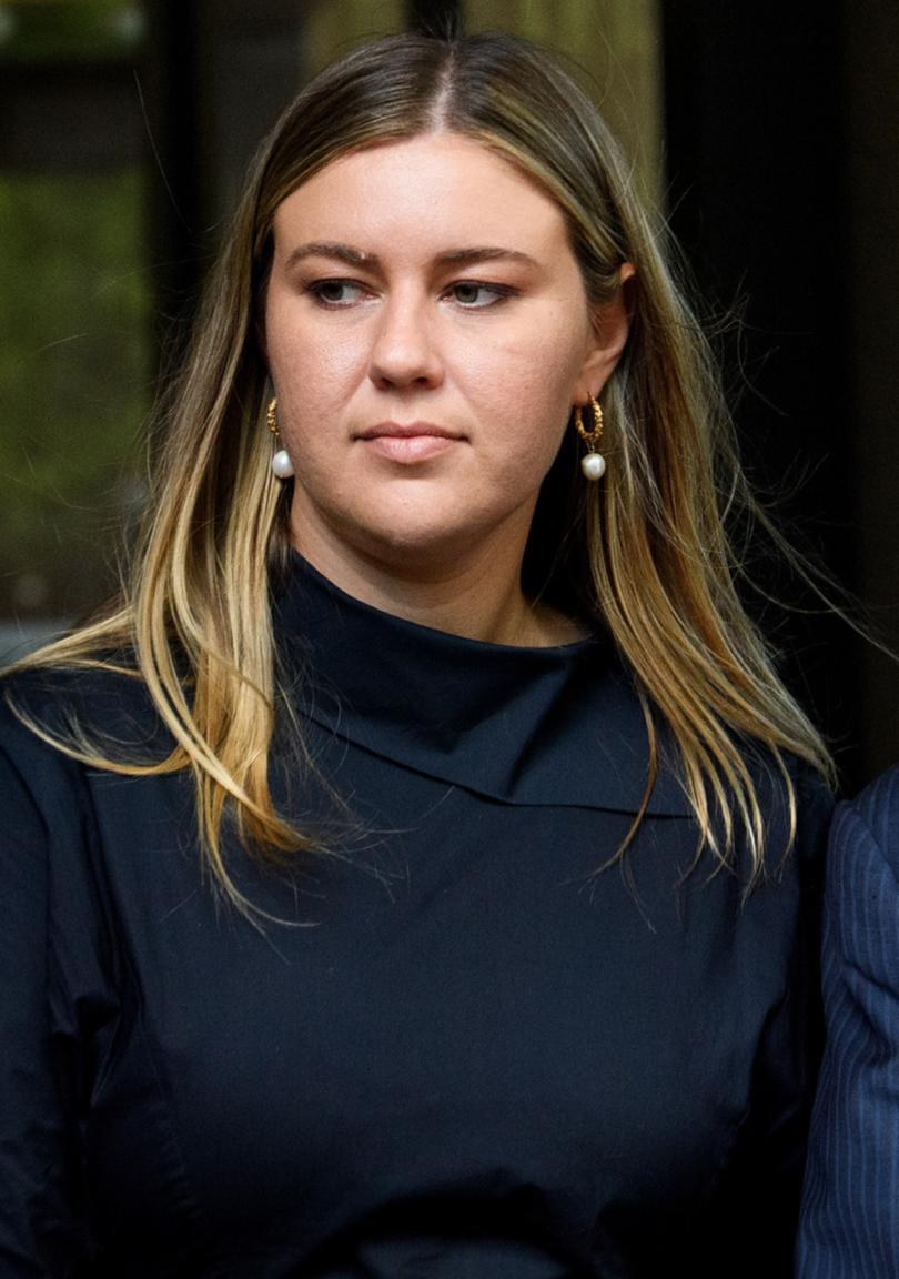 Brittany Higgins (left) departs the Federal Court of Australia in Sydney, Friday, December 1, 2023. Lehrmann is suing Network Ten and journalist Lisa Wilkinson in the Federal Court, claiming their interview with Brittany Higgins on The Project in February 2021 defamed him. (AAP Image/Bianca De Marchi) NO ARCHIVING