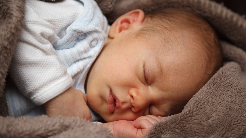A student nurse accused of attempting to kidnap a premature baby had duped her husband into believing she had given birth to twins weeks earlier, a court heard.