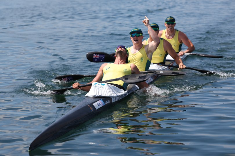 PARIS, FRANCE - AUGUST 08: Silver medalists Riley Fitzsimmons, Pierre van der Westhuyzen, Jackson Collins and Noah Havard of Team Australia celebrate following the Men's Kayak Four 500m Finals on day thirteen of the Olympic Games Paris 2024 at Vaires-Sur-Marne Nautical Stadium on August 08, 2024 in Paris, France. (Photo by Justin Setterfield/Getty Images)