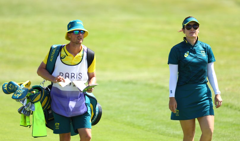 PARIS, FRANCE - AUGUST 08: Hannah Green of Team Australia walks alongside her caddie, Nathan Blasko on the 14th hole during Day Two of the Women's Individual Stroke Play on day thirteen of the Olympic Games Paris 2024 at Le Golf National on August 08, 2024 in Paris, France. (Photo by Andrew Redington/Getty Images)