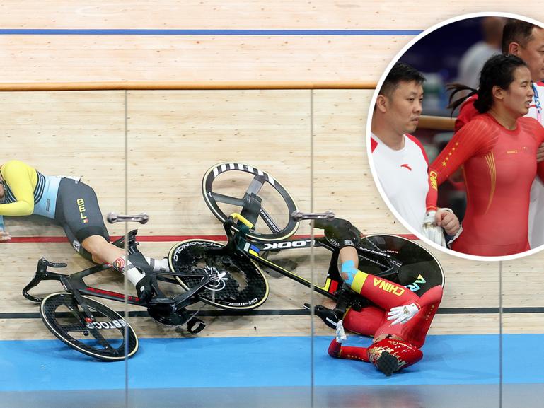  Nicky Degrendele (Belgium) and Liying Yuan (People’s Republic of China) crash during the Women’s Keirin Quarterfinals.