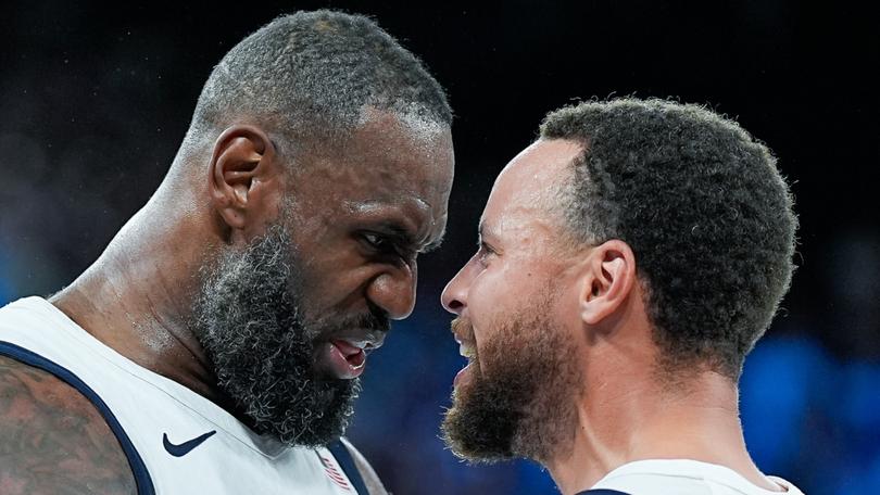 LeBron James and Steph Curry celebrate USA’s win.