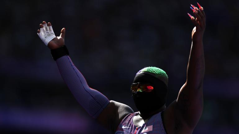 Raven Saunders identifies as non-binary and competes in a mask.