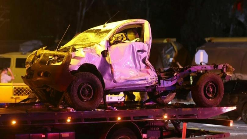 The ute was on the tracks following an earlier car crash.