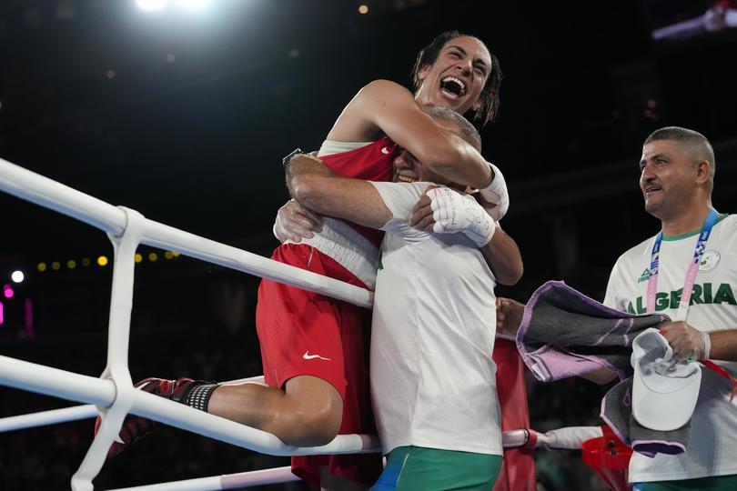 Algeria's Imane Khelif celebrates after defeating China's Yang Liu.