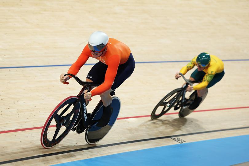 PARIS, FRANCE - AUGUST 09: (L-R) Jeffrey Hoogland of Team Netherlands and Matthew Richardson of Team Australia compete during the Men's Sprint Semifinals - Race 1 on day fourteen of the Olympic Games Paris 2024 at Saint-Quentin-en-Yvelines Velodrome on August 09, 2024 in Paris, France. (Photo by Tim de Waele/Getty Images)