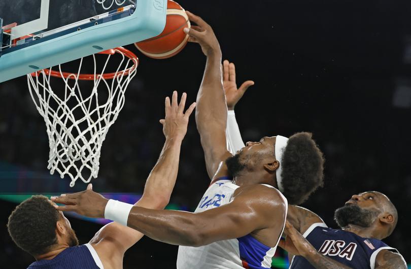 Guerschon Yabusele’s dunk attempt against Steph Curry and LeBron James.