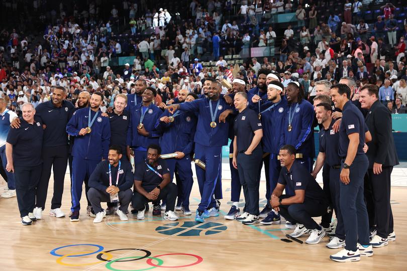 The US crew with their medals.