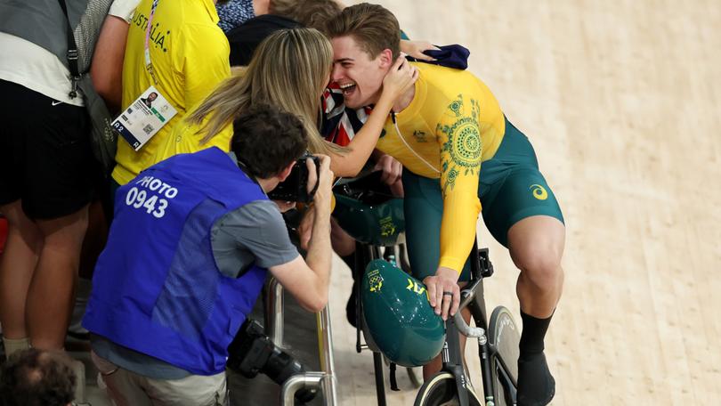 Bronze medalist Matthew Glaetzer of Team Australia celebrates with family after the Men's Keirin, Final.