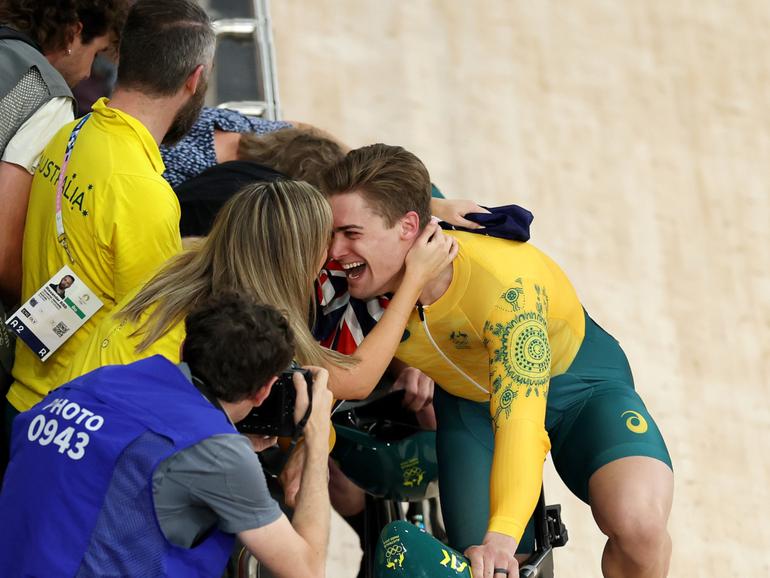 Bronze medalist Matthew Glaetzer of Team Australia celebrates with family after the Men's Keirin, Final.