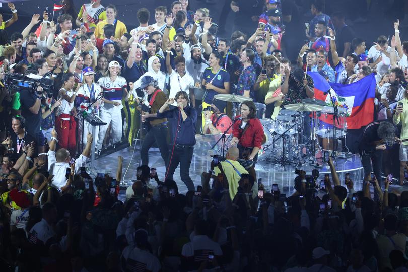 Athletes joined the band Phoenix on stage.