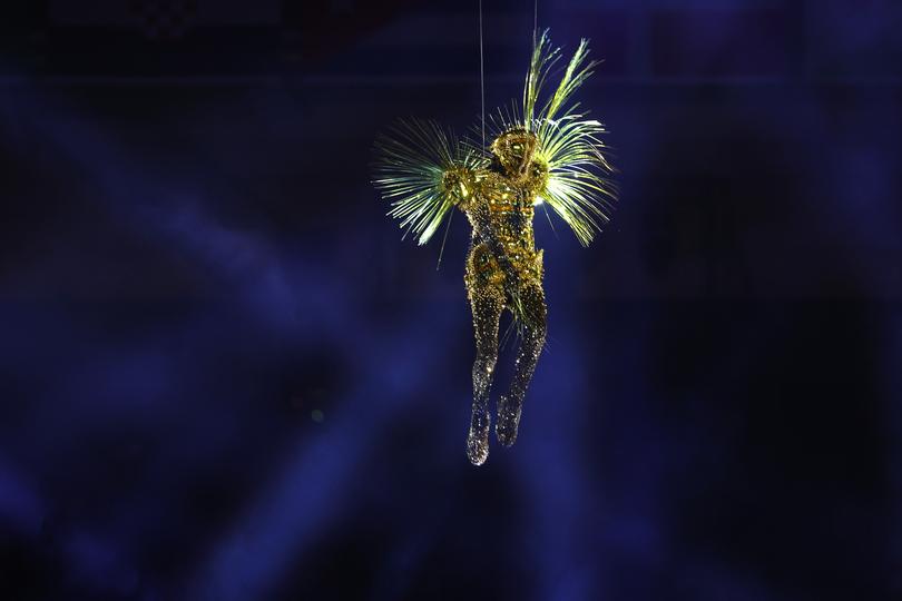 PARIS, FRANCE - AUGUST 11: The Golden Voyager descends into the Stadium as a light show takes place during the Closing Ceremony of the Olympic Games Paris 2024 at Stade de France on August 11, 2024 in Paris, France. (Photo by Michael Reaves/Getty Images)