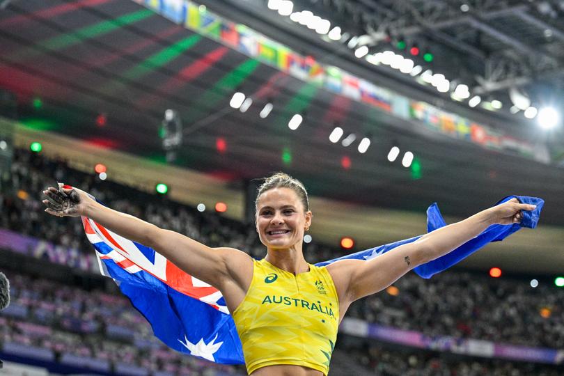PARIS, FRANCE - AUGUST 7: Nina Kennedy of Australia rings the bell after winning gold medal in the Women's Pole Vault Final during Day 12 of Athletics - Olympic Games Paris 2024 at Stade de France on August 7, 2024 in Paris, France. (Photo by Andy Astfalck/BSR Agency/Getty Images)
