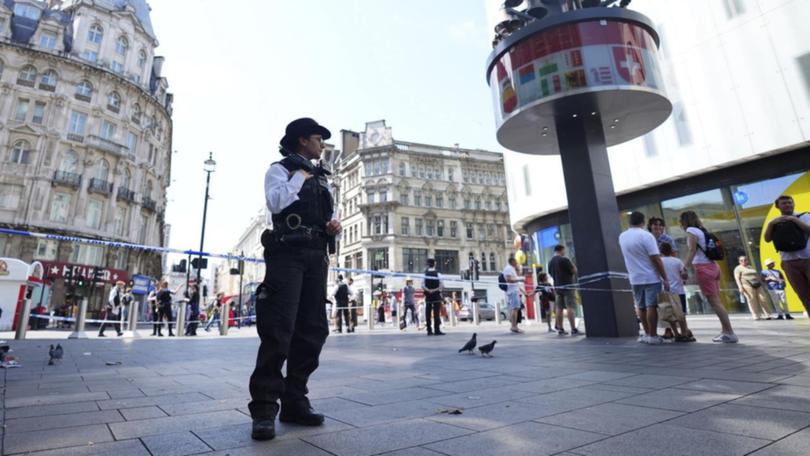 Police have arrested a man accused of stabbing an 11-year-old girl and 34-year-old woman in London.