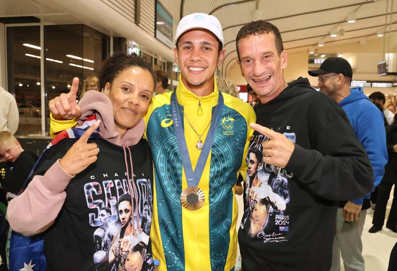 Bronze medal Boxer Charlie Senior with mum Carla and dad Daniel. 