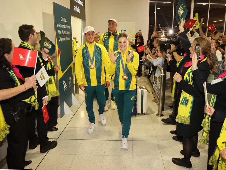 Australian Olympians arrive at Perth Airport after successful Games. 