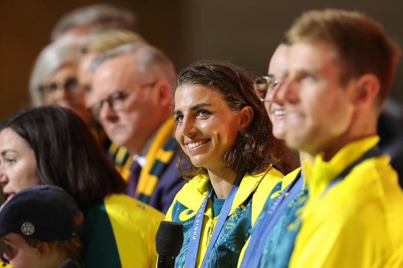 Jessica Fox, Gold medalist in Women's Canoe Slalom Kayak Single and Canoe Single events looks on during the Australian Olympic Games athletes charter flight arrival at Sydney International Airport.