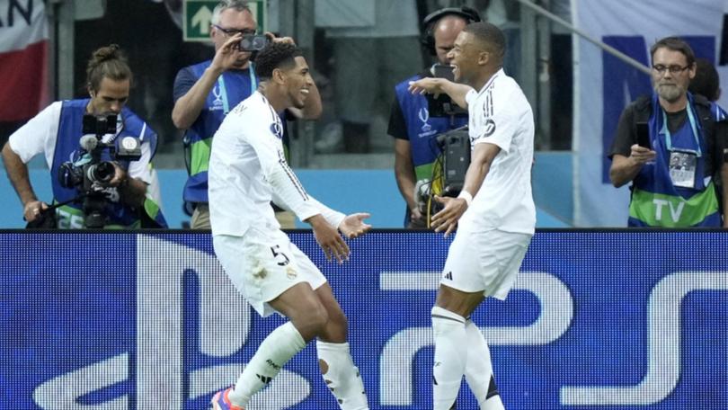 Jude Bellingham has set up Kylian Mbappe (R) for Real Madrid's second goal in the UEFA Super Cup. (AP PHOTO)