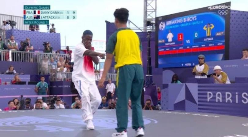 Aussie schoolboy Jeff “J-Attack” Dunne is taunted by French star Dany Dann during the Olympics competition.