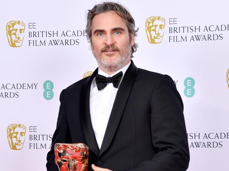 Joaquin Phoenix with his Best Actor award for "The Joker' in the Winners Room during the EE British Academy Film Awards 2020 at Royal Albert Hall.