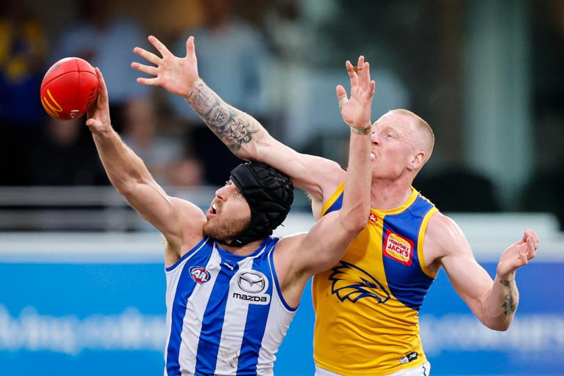 HOBART, AUSTRALIA - AUG 10: Tristan Xerri of the Kangaroos and Bailey J. Williams of the Eagles compete in a ruck contest during the 2024 AFL Round 22 match between the North Melbourne Kangaroos and the West Coast Eagles at Blundstone Arena on August 10, 2024 in Hobart, Australia. (Photo by Dylan Burns/AFL Photos via Getty Images)