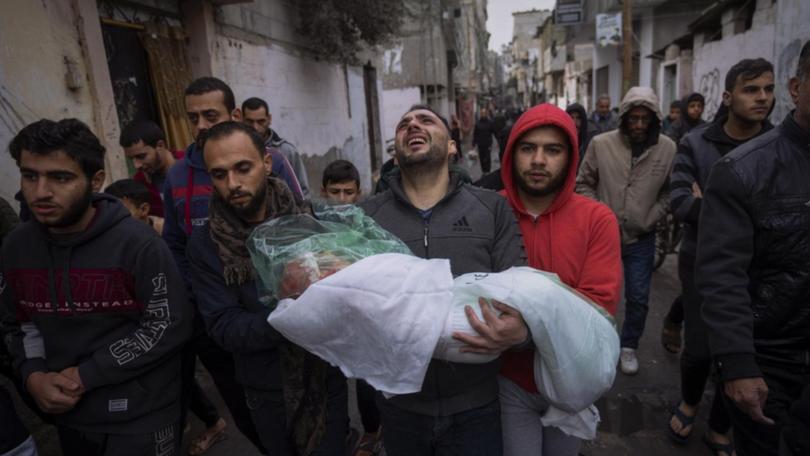 The Gaza health ministry says 40,005 people have been killed in the war, now in its 11th month.