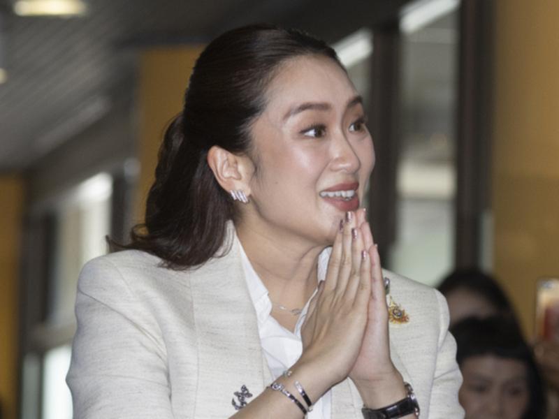 Paetongtarn Shinawatra arrives at the party's headquarters in Bangkok