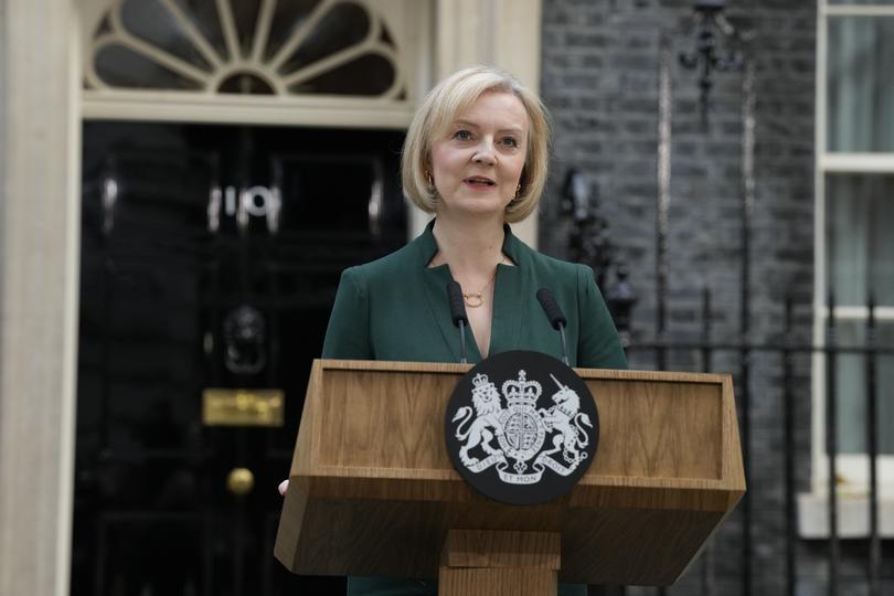 Outgoing British Prime Minister Liz Truss speaks outside Downing Street in London, Tuesday, Oct. 25, 2022. Former Treasury chief Rishi Sunak is set to become Britain's first prime minister of color after being chosen Monday to lead a governing Conservative Party desperate for a safe pair of hands to guide the country through economic and political turbulence. (AP Photo/Frank Augstein)