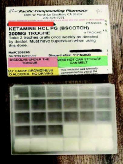 In an image presented into court evidence and blurred by the source, ketamine lozenges. 