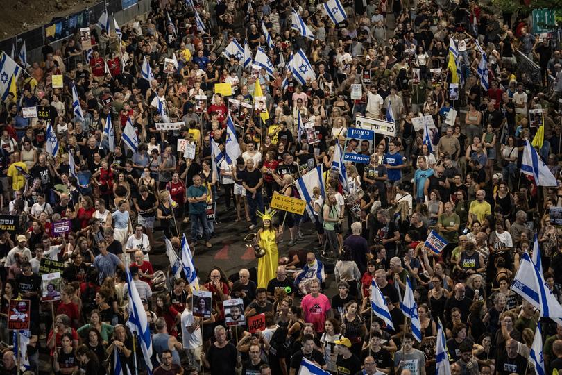 Israelis demonstrate in Tel Aviv calling for the immediate release of Israeli hostages held by Hamas in Gaza, and for the government to be replaced.