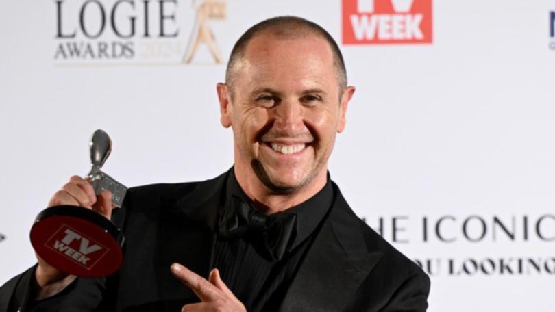 Much-loved host Larry Emdur finally got his hands on a Logie - Gold and Silver. (Bianca De Marchi/AAP PHOTOS)