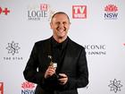 Larry Emdur poses for a photograph after winning the Gold Logie at the 64th Television Week Logie Awards presentation ceremony.