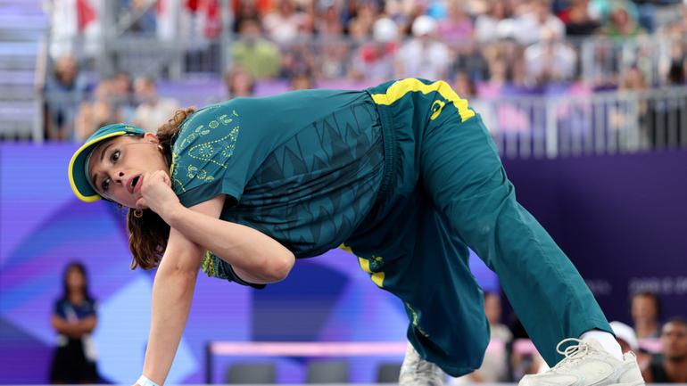 PARIS, FRANCE - AUGUST 09: B-Girl Raygun of Team Australia 
competes during the B-Girls Round Robin - Group B on day fourteen of the Olympic Games Paris 2024 at Place de la Concorde on August 09, 2024 in Paris, France. (Photo by Elsa/Getty Images)