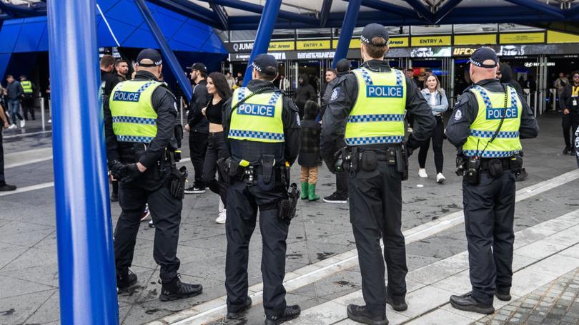 Police maintained a heavy presence as fans left RAC Arena following UFC 305.