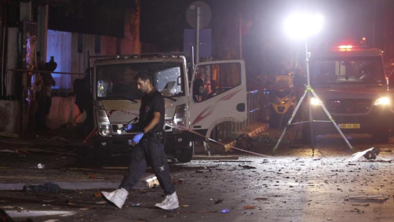 Police in Tel Aviv say a man who was carrying a bomb was killed and a passer-by was injured.
