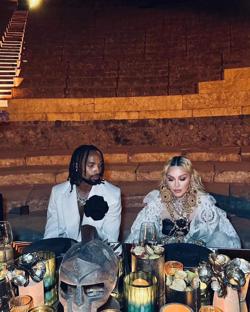 Madonna shared a plethora of glamorous snaps from her epic 66th birthday celebrations to Instagram. The songstress posted snaps from her lavish celebrations in Italy to her account on Monday morning, featuring photos of her birthday bash with her new boyfriend Akeem Morris, 28, and her six children. 
PICTURED: Fans were given a glimpse into Madonna's luxury celebrations which saw the Material Girl songstress enjoy a lavish feast with a seat right next to her boyfriend