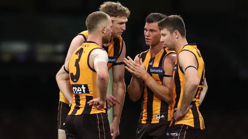 Tom Mitchell, Ben McEvoy, Jaeger O'Meara and Liam Shiels playing for the Hawks in 2020.