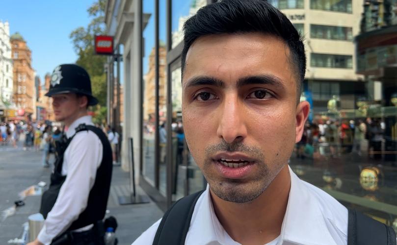 Security guard Abdullah, 29, who works at TWG Tea shop at the scene in Leicester Square, London, following the arrest of a man after an 11-year-old girl and 34-year-old woman were stabbed. Picture date: Monday August 12, 2024.. See PA story POLICE LeicesterSquare. Photo credit should read: Eleanor Cunningham/PA Wire