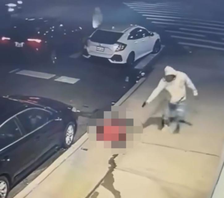 A man is shot dead on the pavement in another video  before the shooter returns and discharges more bullets into his limp body. 