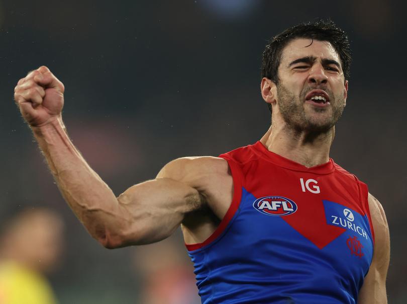 MELBOURNE, AUSTRALIA - MAY 09: Christian Petracca of the Demons celebrates after scoring a goal during the round nine AFL match between Carlton Blues and Melbourne Demons at Melbourne Cricket Ground, on May 09, 2024, in Melbourne, Australia. (Photo by Robert Cianflone/Getty Images)