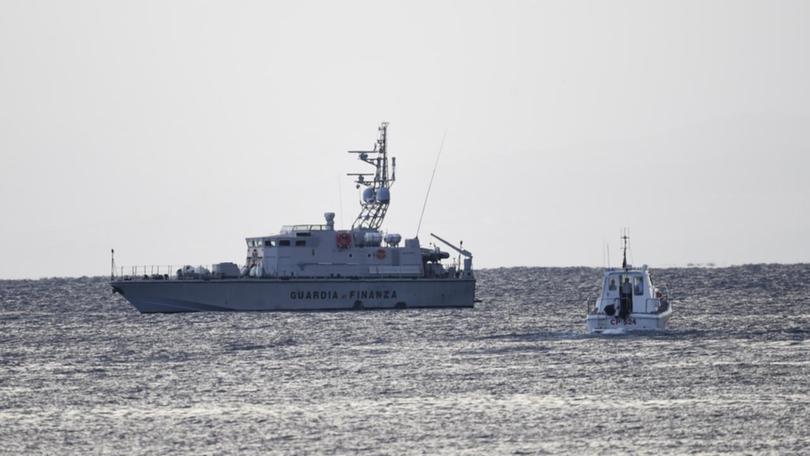 Emergency services search for a missing boat off Porticello