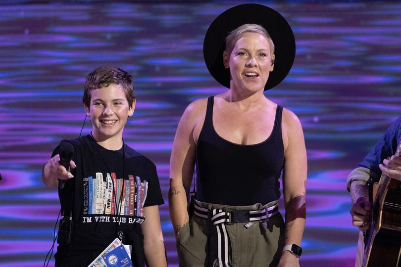 US music artist Pink (R) and her daughter Willow (L) perform during a sound check before the start of the fourth night of the Democratic National Convention.