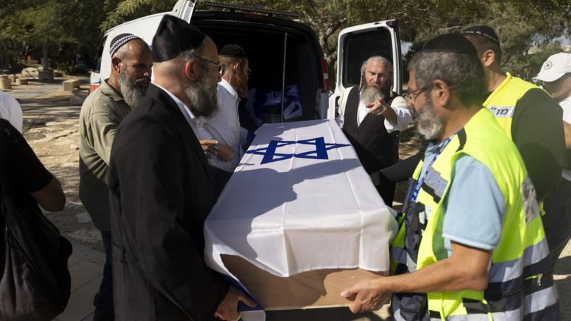 A funeral for Avraham Munder, one of the six dead hostages found by the IDF in Khan Younis this week.