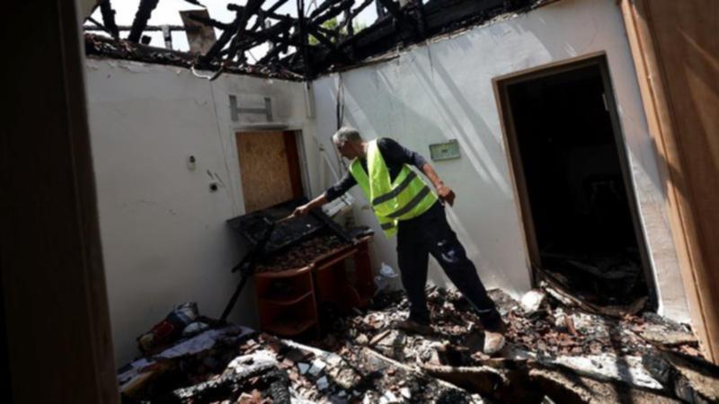 The Israeli military says about 40 projectiles were identified crossing from Lebanese territory.