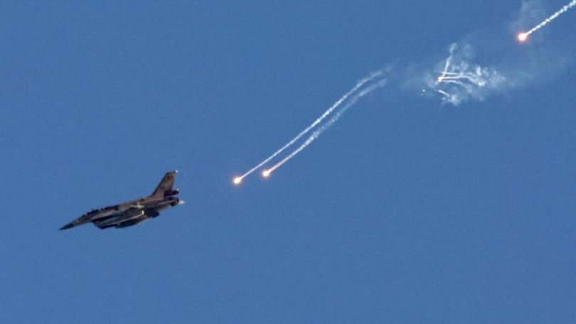 About 100 Israeli military jets have struck Hezbollah sites inside Lebanon, the army says. (EPA PHOTO)